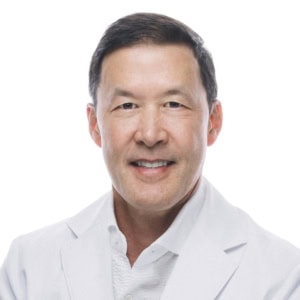 Dr. Gustav Lo, MD, Chief Medical Officer of RegenCen, in a white lab coat